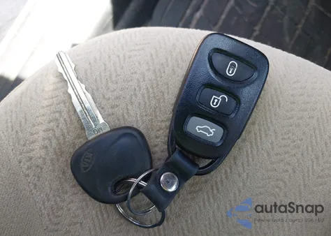 2009 Kia Optima Lx from USA, damaged, VIN KNAGE228395297115